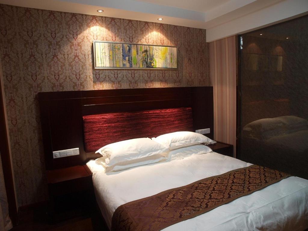 Yiwu Midi Hotel Quarto foto